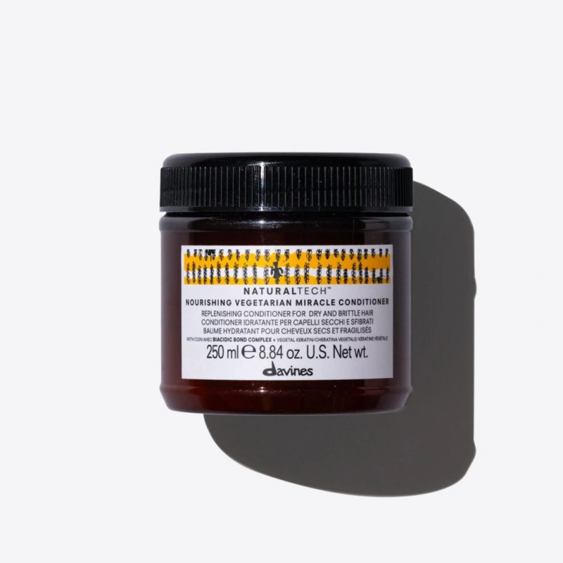 Живильний кондиціонер для волосся DAVINES NOURISHING Vegetarian Miracle Mask для тьмяного, густого або неслухняного волосся 250 мл Живильний кондиціонер для волосся DAVINES NOURISHING Vegetarian Miracle Mask для тьмяного, густого або неслухняного волосся 250 мл